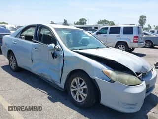 2005 Toyota Camry LE with VIN 4T1BF32K65U614571, listed as a IAAI auction lot 42328488 with 237,413 mi miles and . Bid and sale history available at DreamBid. Image 1.