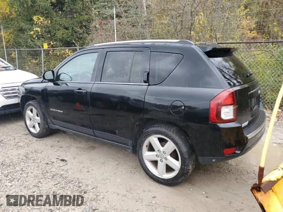 2014 Jeep Compass Latitude with VIN 1C4NJCEA5ED732288, listed as a Copart auction lot 82689185 with 102,856 mi miles and Clean title. Bid and sale history available at DreamBid. Image 2.