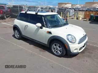2012 MINI Hardtop with VIN WMWSU3C50CT255544, listed as a IAAI auction lot 42533243 with 102,422 mi miles and . Bid and sale history available at DreamBid. Image 1.
