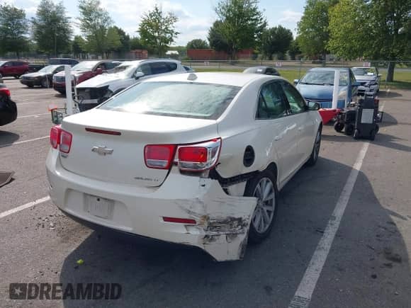 2013 Chevrolet Malibu LT with VIN 1G11E5SA0DF340379, listed as a IAAI auction lot 43095448 with 124,745 mi miles and . Bid and sale history available at DreamBid. Image 4.