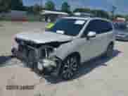 2017 Subaru Forester Touring z VIN JF2SJGWC6HH434017, wystawiony jako IAAI lot #42676511 z przebiegiem 110 981 mil mil oraz . Historia ofert i sprzedaży dostępna na DreamBid. Obrazek 19.