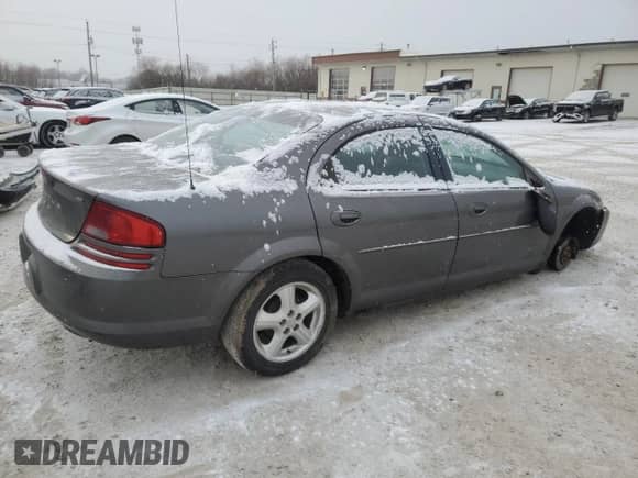 2004 Dodge Stratus SXT z VIN 1B3EL46XX4N212066, wystawiony jako Copart lot #84729654 z przebiegiem 204 471 mil mil oraz Czysty tytuł • Clean title. Historia ofert i sprzedaży dostępna na DreamBid. Obrazek 3.