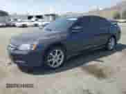 2006 Honda Accord LX with VIN 1HGCM55446A181344, listed as a Copart auction lot 60917765 with 154,099 mi miles and Salvage title. Bid and sale history available at DreamBid. Image 1.