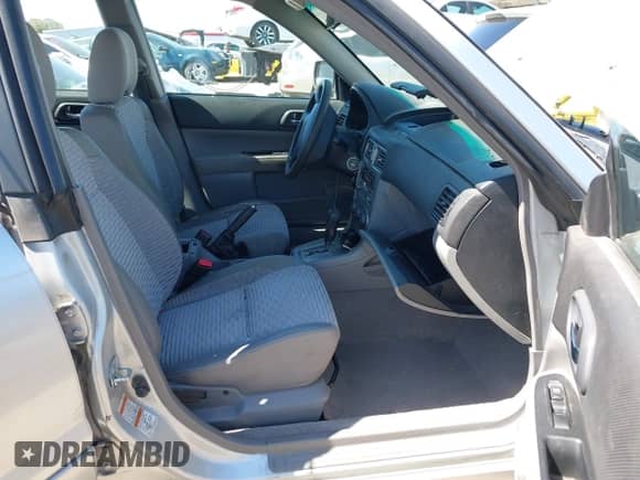 2003 Subaru Forester XS with VIN JF1SG65683H750374, listed as a IAAI auction lot 43253226 with 254,104 mi miles and . Bid and sale history available at DreamBid. Image 5.