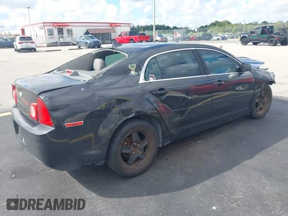 2012 Chevrolet Malibu 1LS with VIN 1G1ZB5E04CF296903, listed as a IAAI auction lot 43410779 with 141,987 mi miles and . Bid and sale history available at DreamBid. Image 4.