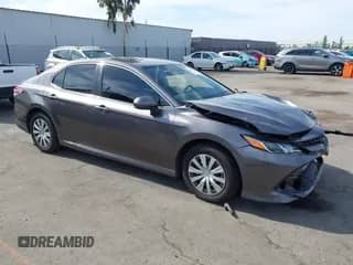 2020 Toyota Camry Hybrid LE with VIN 4T1C31AK4LU011201, listed as a IAAI auction lot 43055779 with 145,788 mi miles and . Bid and sale history available at DreamBid. Image 1.