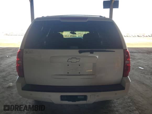 2007 Chevrolet Tahoe LS z VIN 1GNFC13007J380164, wystawiony jako Copart lot #84642765 z przebiegiem Nie podano mil oraz Szkoda całkowita • Salvage title. Historia ofert i sprzedaży dostępna na DreamBid. Obrazek 6.