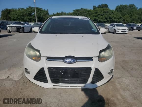 2014 Ford Focus Titanium with VIN 1FADP3J26EL218485, listed as a Copart auction lot 69675825 with Not provided miles and Salvage title. Bid and sale history available at DreamBid. Image 5.