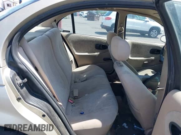 1999 Saturn SL z VIN 1G8ZK5275XZ283178, wystawiony jako IAAI lot #42303549 z przebiegiem 216 776 mil mil oraz . Historia ofert i sprzedaży dostępna na DreamBid. Obrazek 8.