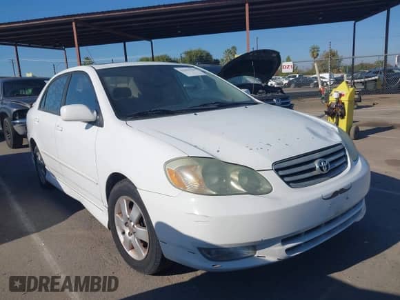 2004 Toyota Corolla CE z VIN 1NXBR32E14Z319846, wystawiony jako IAAI lot #43461526 z przebiegiem 183 920 mil mil oraz . Historia ofert i sprzedaży dostępna na DreamBid. Obrazek 1.