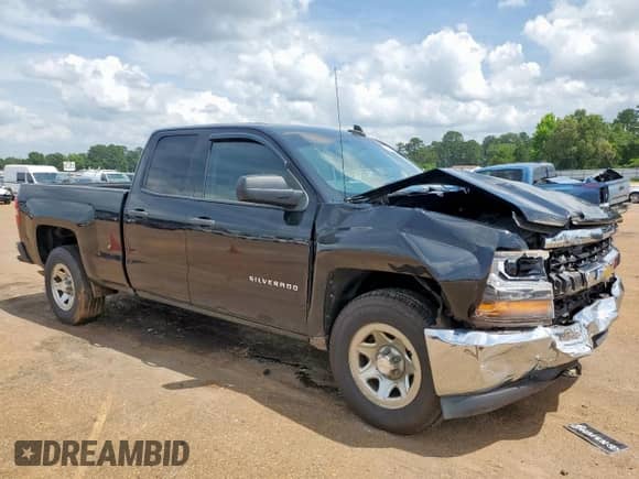 2016 Chevrolet Silverado 1500 Work Truck with VIN 1GCRCNEH0GZ187935, listed as a Copart auction lot 60215835 with 140,458 mi miles and Salvage title. Bid and sale history available at DreamBid. Image 4.