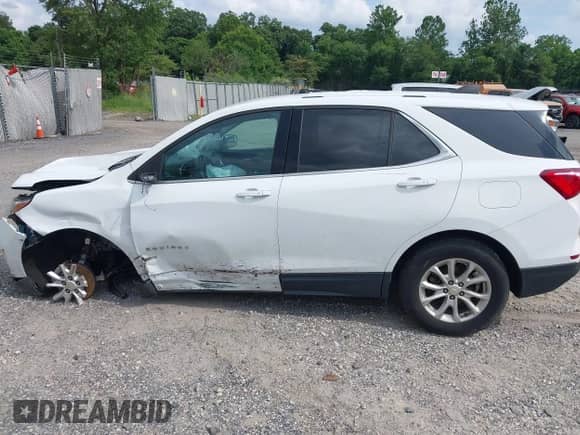 2019 Chevrolet Equinox LT z VIN 2GNAXTEV8K6239836, wystawiony jako IAAI lot #42742280 z przebiegiem 94 215 mil mil oraz . Historia ofert i sprzedaży dostępna na DreamBid. Obrazek 14.