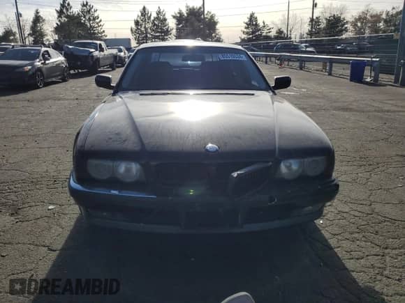 1999 BMW 7 Series 740iL with VIN WBAGH833XXDP05481, listed as a Copart auction lot 85510534 with 159,680 mi miles and Salvage title. Bid and sale history available at DreamBid. Image 5.