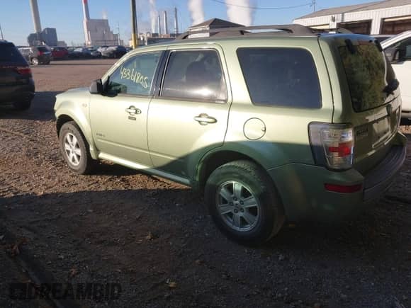 2008 Mercury Mariner with VIN 4M2CU91Z28KJ30312, listed as a IAAI auction lot 43361805 with 218,042 mi miles and . Bid and sale history available at DreamBid. Image 3.