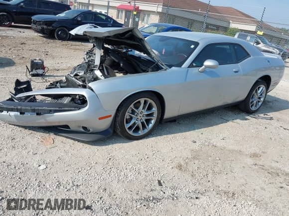 2022 Dodge Challenger GT with VIN 2C3CDZKG1NH234493, listed as a IAAI auction lot 42916154 with 57,781 mi miles and . Bid and sale history available at DreamBid. Image 2.