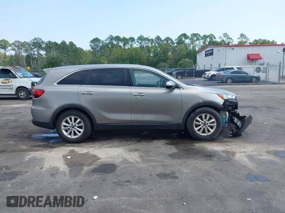 2019 Kia Sorento LX with VIN 5XYPG4A54KG512708, listed as a IAAI auction lot 43274077 with 53,859 mi miles and . Bid and sale history available at DreamBid. Image 13.