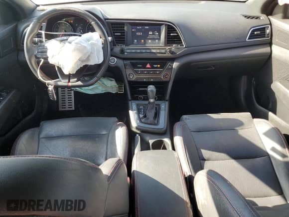 2018 Hyundai Elantra Sport с VIN KMHD04LB7JU468187, выставлен на аукционе Copart как лот 70500755 с пробегом 127 473 миль миль и Списание • Salvage title. История ставок и продаж доступна на DreamBid. Изображение 8.