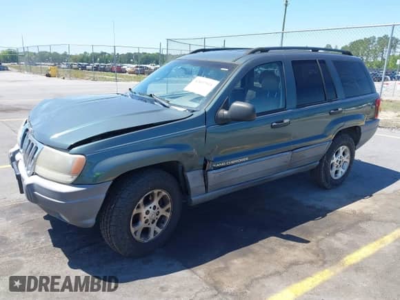 2002 Jeep Grand Cherokee с VIN 1J4GX38S12C244933, выставлен на аукционе IAAI как лот 42037931 с пробегом 171 201 миль миль и . История ставок и продаж доступна на DreamBid. Изображение 2.