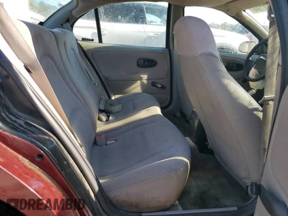 2001 Saturn SL with VIN 1G8ZH54841Z290618, listed as a Copart auction lot 77850194 with 128,083 mi miles and Salvage title. Bid and sale history available at DreamBid. Image 10.