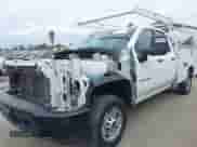 2020 Chevrolet Silverado 2500HD Work Truck z VIN 1GB2WLE78LF284403, wystawiony jako IAAI lot #42076524 z przebiegiem 21 478 mil mil oraz . Historia ofert i sprzedaży dostępna na DreamBid. Obrazek 2.