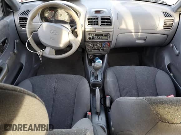 2001 Hyundai Accent GL с VIN KMHCG45C11U193879, выставлен на аукционе Copart как лот 37525334 с пробегом 150 951 миль миль и Списание • Salvage title. История ставок и продаж доступна на DreamBid. Изображение 8.