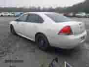 2013 Chevrolet Impala Police z VIN 2G1WD5E33D1210058, wystawiony jako IAAI lot #41574143 z przebiegiem 156 643 mil mil oraz . Historia ofert i sprzedaży dostępna na DreamBid. Obrazek 3.