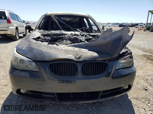 2007 BMW 5 Series 525i with VIN WBANE53527CW68691, listed as a Copart auction lot 57915145 with Not provided miles and Non repairable. Bid and sale history available at DreamBid. Image 5.