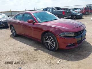2019 Dodge Charger SXT with VIN 2C3CDXJG3KH527801, listed as a IAAI auction lot 43076807 with 114,643 mi miles and . Bid and sale history available at DreamBid. Image 1.
