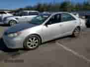 2005 Toyota Camry XLE with VIN 4T1BF30K05U595874, listed as a Copart auction lot 84923435 with 194,695 mi miles and Salvage title. Bid and sale history available at DreamBid. Image 1.