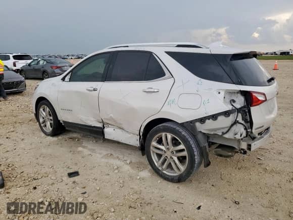 2020 Chevrolet Equinox Premier с VIN 3GNAXNEV2LS733396, выставлен на аукционе Copart как лот 69283535 с пробегом 41 486 миль миль и Списание • Salvage title. История ставок и продаж доступна на DreamBid. Изображение 2.