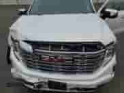 2023 GMC Sierra 1500 Denali z VIN 1GTUUGED3PZ109844, wystawiony jako Copart lot #59780445 z przebiegiem 32 409 mil mil oraz Szkoda całkowita • Salvage title. Historia ofert i sprzedaży dostępna na DreamBid. Obrazek 11.