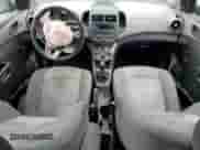 2015 Chevrolet Sonic LS with VIN 1G1JB5SG0F4210338, listed as a Copart auction lot 63960604 with 210,499 mi miles and Salvage title. Bid and sale history available at DreamBid. Image 8.