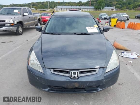 2005 Honda Accord EX-L with VIN 1HGCM568X5A089509, listed as a IAAI auction lot 43148316 with 187,695 mi miles and . Bid and sale history available at DreamBid. Image 12.