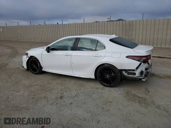 2023 Toyota Camry Hybrid SE with VIN 4T1S31AK0PU046562, listed as a Copart auction lot 69478395 with 84,935 mi miles and Salvage title. Bid and sale history available at DreamBid. Image 2.