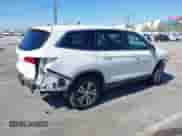 2018 Honda Pilot EX-L with VIN 5FNYF5H52JB026830, listed as a IAAI auction lot 42853756 with 15,305 mi miles and . Bid and sale history available at DreamBid. Image 4.