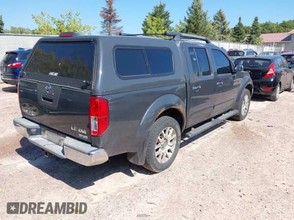 2010 Nissan Frontier LE with VIN 1N6AD0EV3AC415758, listed as a IAAI auction lot 43178391 with 162,783 mi miles and . Bid and sale history available at DreamBid. Image 4.