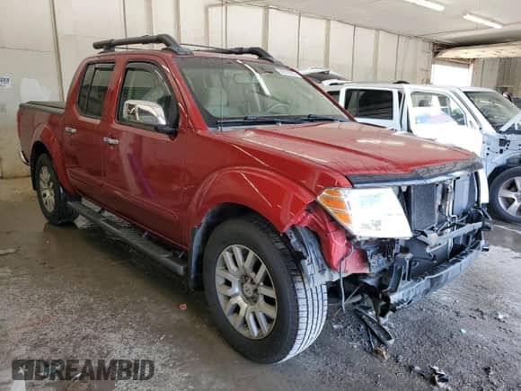 2009 Nissan Frontier SE with VIN 1N6AD07U19C400918, listed as a Copart auction lot 63518385 with 138,227 mi miles and Salvage title. Bid and sale history available at DreamBid. Image 4.