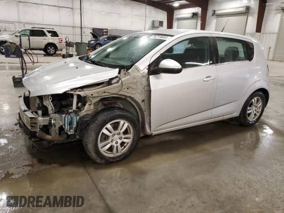 2012 Chevrolet Sonic LT с VIN 1G1JC6SB1C4193651, выставлен на аукционе Copart как лот 76319664 с пробегом 181 348 миль миль и Списание • Salvage title. История ставок и продаж доступна на DreamBid. Изображение 1.
