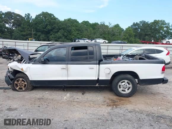 2001 Dodge Dakota Sport z VIN 1B7GL2ANX1S192531, wystawiony jako IAAI lot #42986635 z przebiegiem 259 173 mil mil oraz . Historia ofert i sprzedaży dostępna na DreamBid. Obrazek 14.