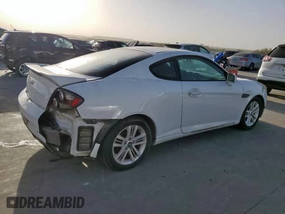 2007 Hyundai Tiburon GS с VIN KMHHM66D27U260421, выставлен на аукционе Copart как лот 48982505 с пробегом 100 045 миль миль и Чистый • Clean title. История ставок и продаж доступна на DreamBid. Изображение 3.