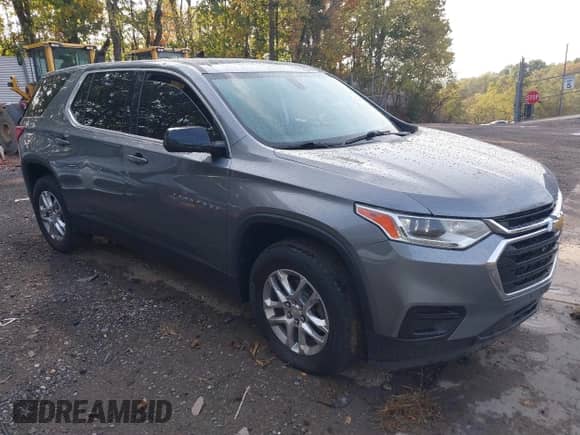 2019 Chevrolet Traverse LS z VIN 1GNERFKW6KJ215239, wystawiony jako IAAI lot #43262435 z przebiegiem 91 631 mil mil oraz . Historia ofert i sprzedaży dostępna na DreamBid. Obrazek 1.