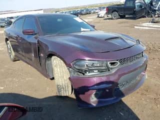 2021 Dodge Charger Scat Pack Widebody z VIN 2C3CDXGJ6MH520735, wystawiony jako IAAI lot #41601847 z przebiegiem 67 213 mil mil oraz . Historia ofert i sprzedaży dostępna na DreamBid. Obrazek 1.