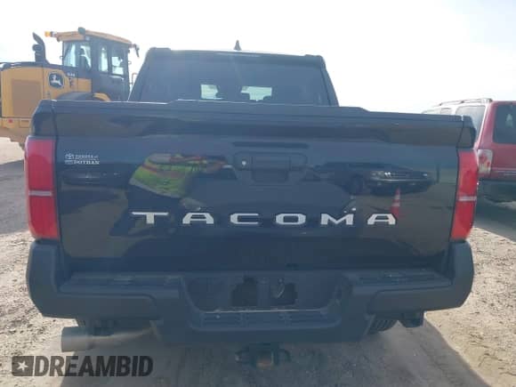 2024 Toyota Tacoma SR with VIN 3TYKD5HN5RT003937, listed as a IAAI auction lot 41339802 with 13,117 mi miles and . Bid and sale history available at DreamBid. Image 16.