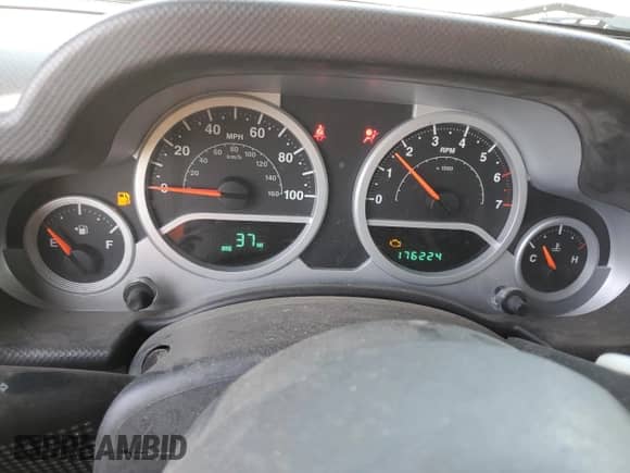 2008 Jeep Wrangler Unlimited Rubicon z VIN 1J8GA69198L550682, wystawiony jako Copart lot #57333575 z przebiegiem 176 224 mil mil oraz Szkoda całkowita • Salvage title. Historia ofert i sprzedaży dostępna na DreamBid. Obrazek 9.