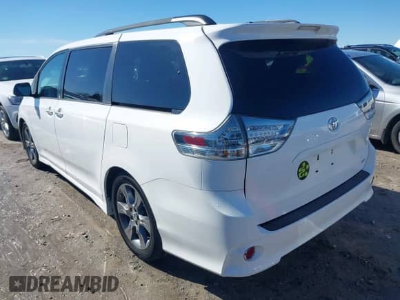 2015 Toyota Sienna SE with VIN 5TDXK3DC4FS658148, listed as a IAAI auction lot 41601341 with 110,329 mi miles and . Bid and sale history available at DreamBid. Image 3.