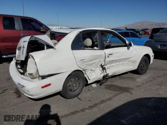 2003 Hyundai Accent GL z VIN KMHCG45C23U482563, wystawiony jako Copart lot #58358165 z przebiegiem 125 838 mil mil oraz Szkoda całkowita • Salvage title. Historia ofert i sprzedaży dostępna na DreamBid. Obrazek 3.