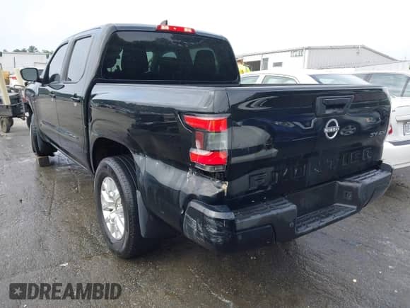 2023 Nissan Frontier SV with VIN 1N6ED1EK7PN609865, listed as a IAAI auction lot 42242070 with 56,462 mi miles and . Bid and sale history available at DreamBid. Image 3.