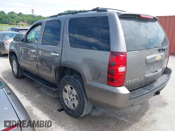 2013 Chevrolet Tahoe LS with VIN 1GNSKAE05DR155928, listed as a IAAI auction lot 42337097 with 191,634 mi miles and . Bid and sale history available at DreamBid. Image 3.