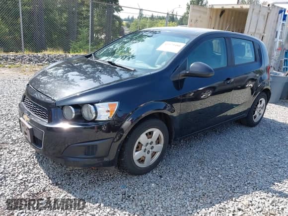 2013 Chevrolet Sonic LS with VIN 1G1JB6SG0D4252673, listed as a IAAI auction lot 42579480 with 161,686 mi miles and . Bid and sale history available at DreamBid. Image 2.