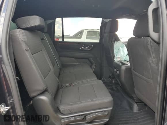 2023 Chevrolet Suburban LS с VIN 1GNSCBKD4PR403603, выставлен на аукционе Copart как лот 65908005 с пробегом 26 049 миль миль и Списание • Salvage title. История ставок и продаж доступна на DreamBid. Изображение 11.